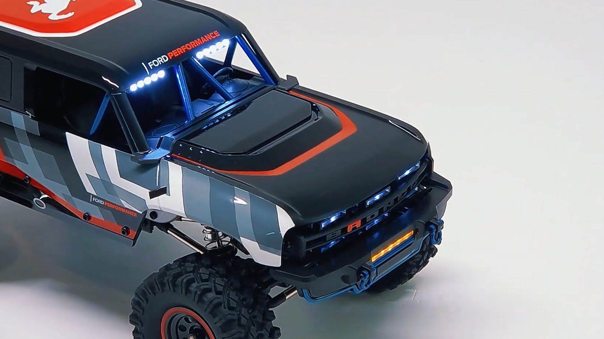 How is the lighting system on the MJX Hyper Go H18P RC Car?